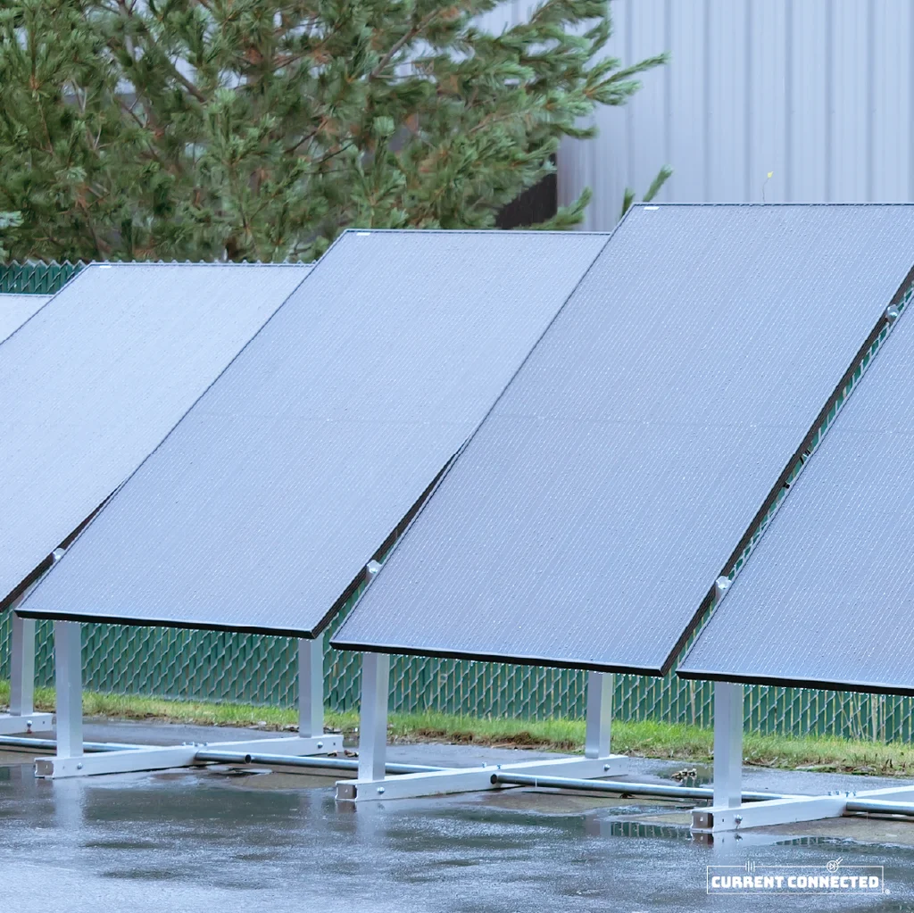 Picture of multiple panels in the rain. Each panel tilts at a different angle.